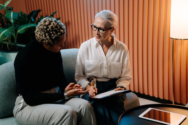 A landlord speaking with a tenant